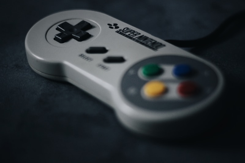 SNES controller resting on a dark surface